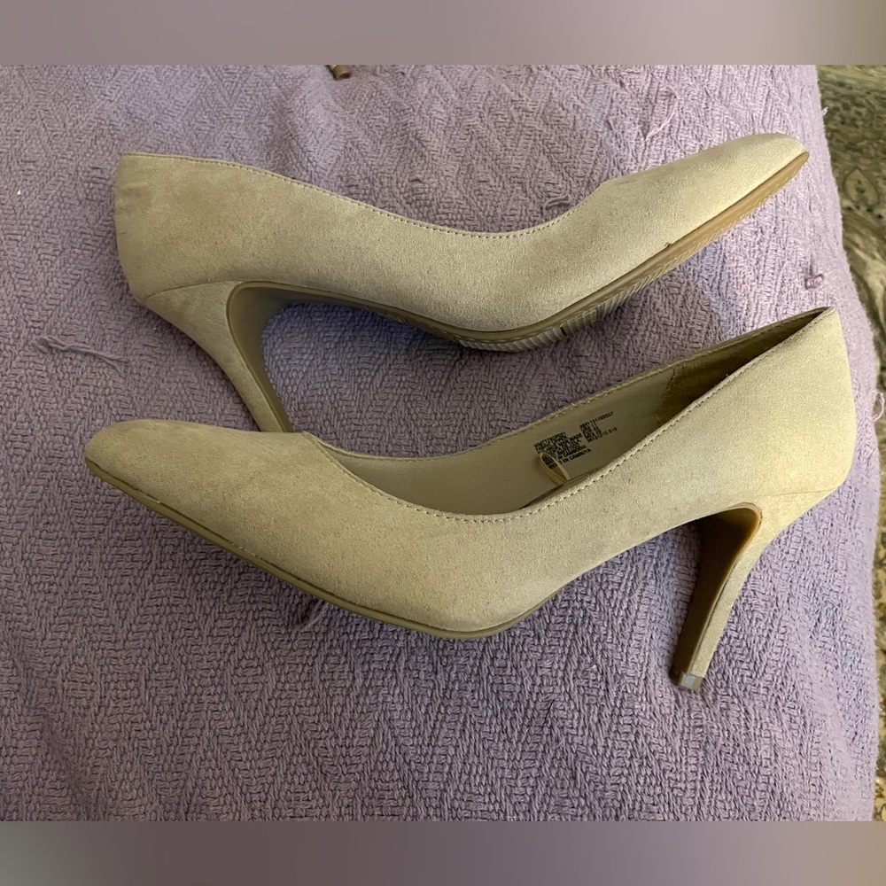 Size 11 tan heels.  Never worn